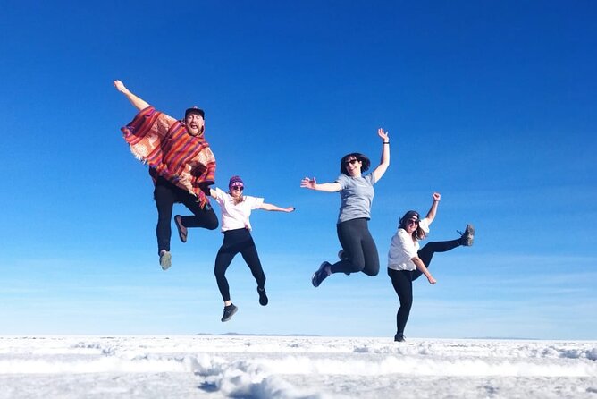 3-Day Uyuni Salt Flat Tour with Sunset and Red Lagoons - Flamingos and volcano views on day two