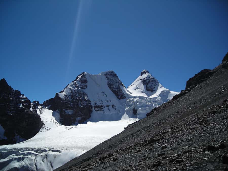 From La Paz: Condoriri Andes, Pico Austria Full Day Hiking - Condoriri Lake and a mountain range shaped like a condor