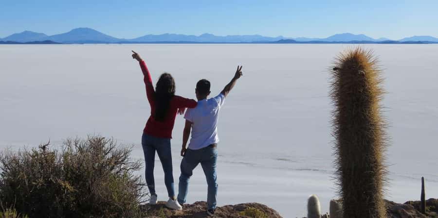 From La Paz: Trip to Uyuni Salt Flats with Wine at Sunset - Salt architecture, flags, and the Dakar Monument