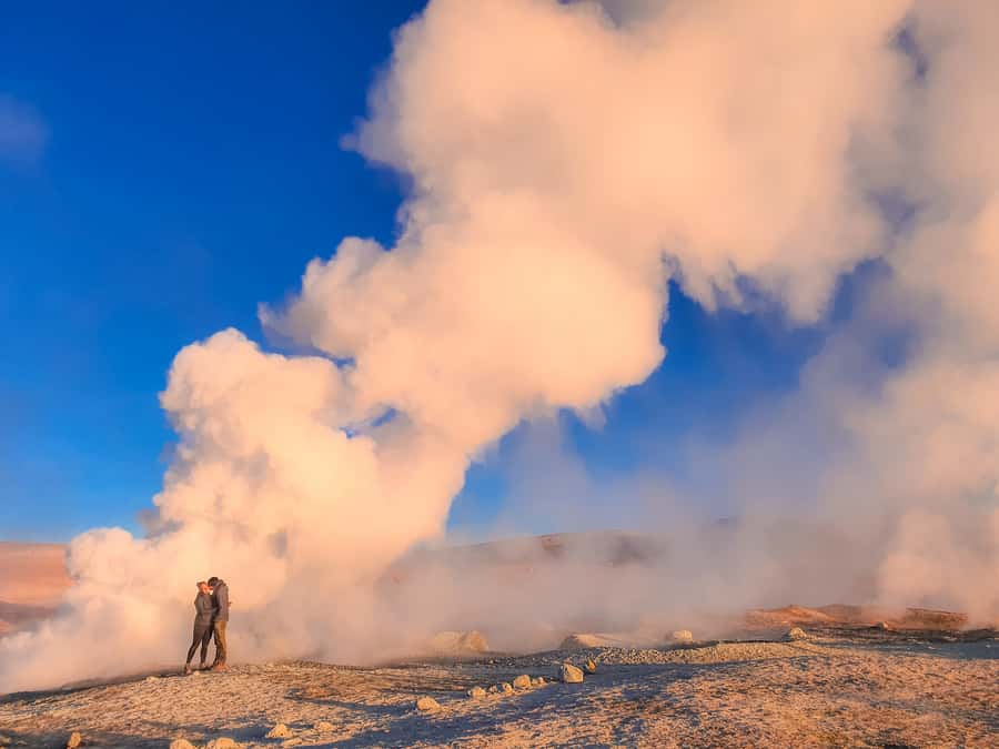 From Uyuni: Red Lagoon & Uyuni Salt Flats 3-Day Guided Tour - Day two: volcanoes, flamingos, and the Red Lagoon