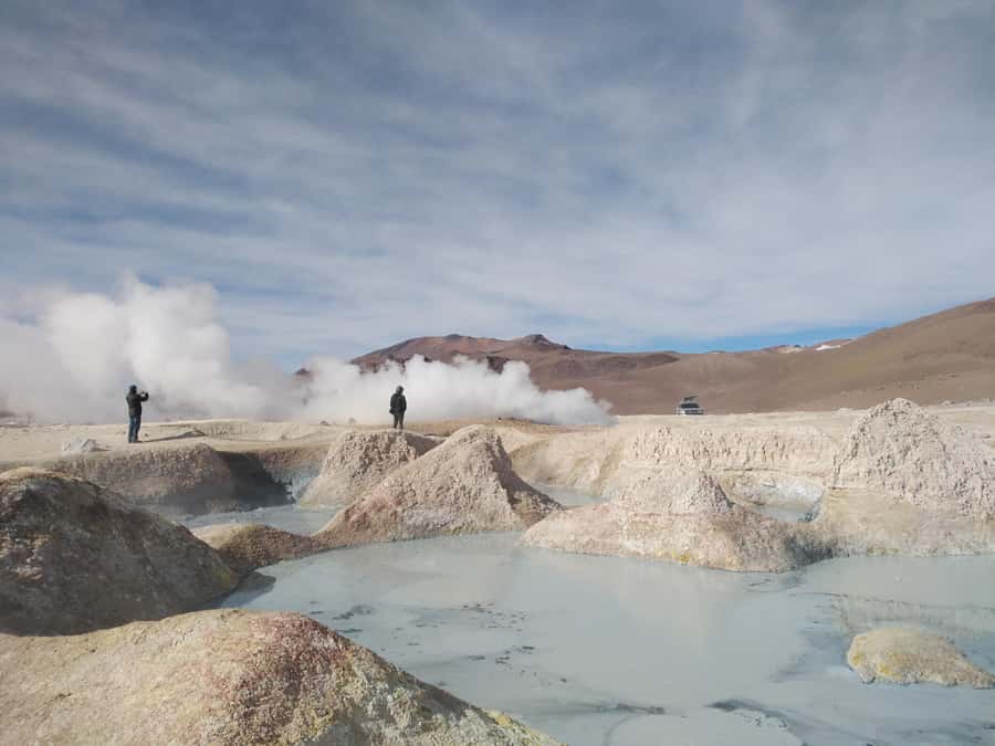 La Paz: Uyuni tour ending in Atacama Chile by bus. - Flamingos and volcano views on Day 3