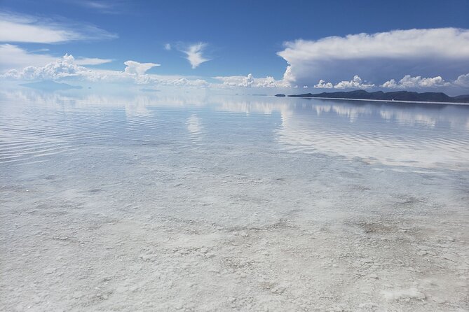 Salar de Uyuni tours 1 day - Playa Blanca and the flag-filled salt hotel